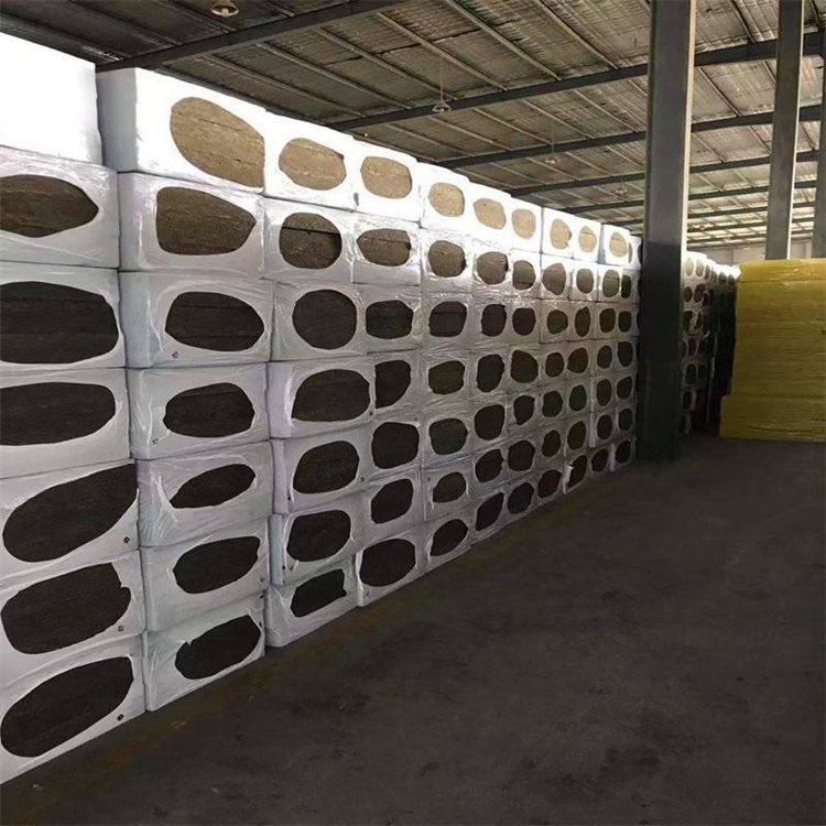 Fibre compacted rock wool slab minimising fibre shedding on duct installation
