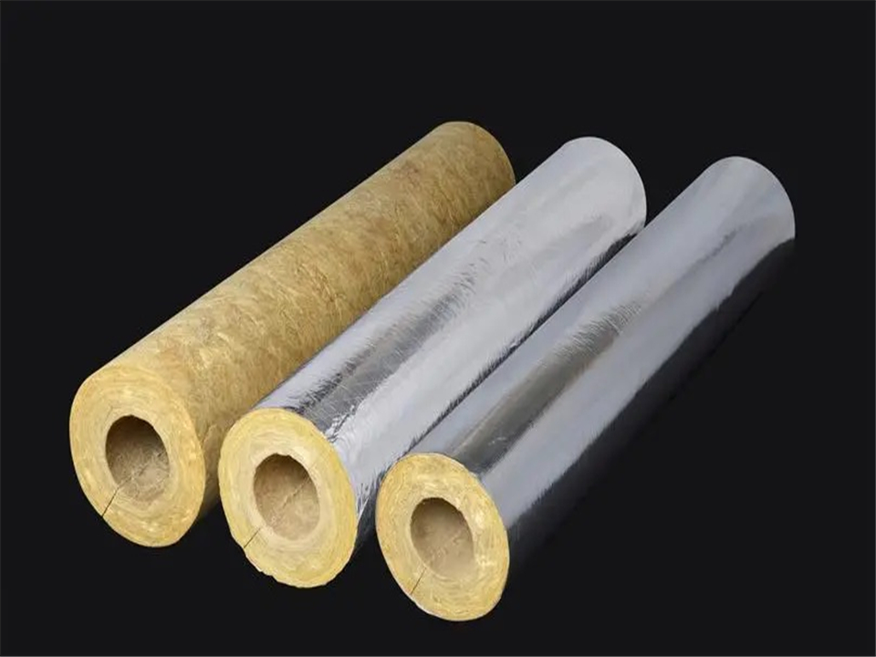 Self-adhesive overlapping foil-faced rock wool pipe sections for fast on-site installation
