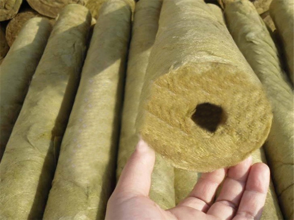 Hydrophobic rock wool pipe sections reducing heat loss on high-temperature steam and heating pipelines