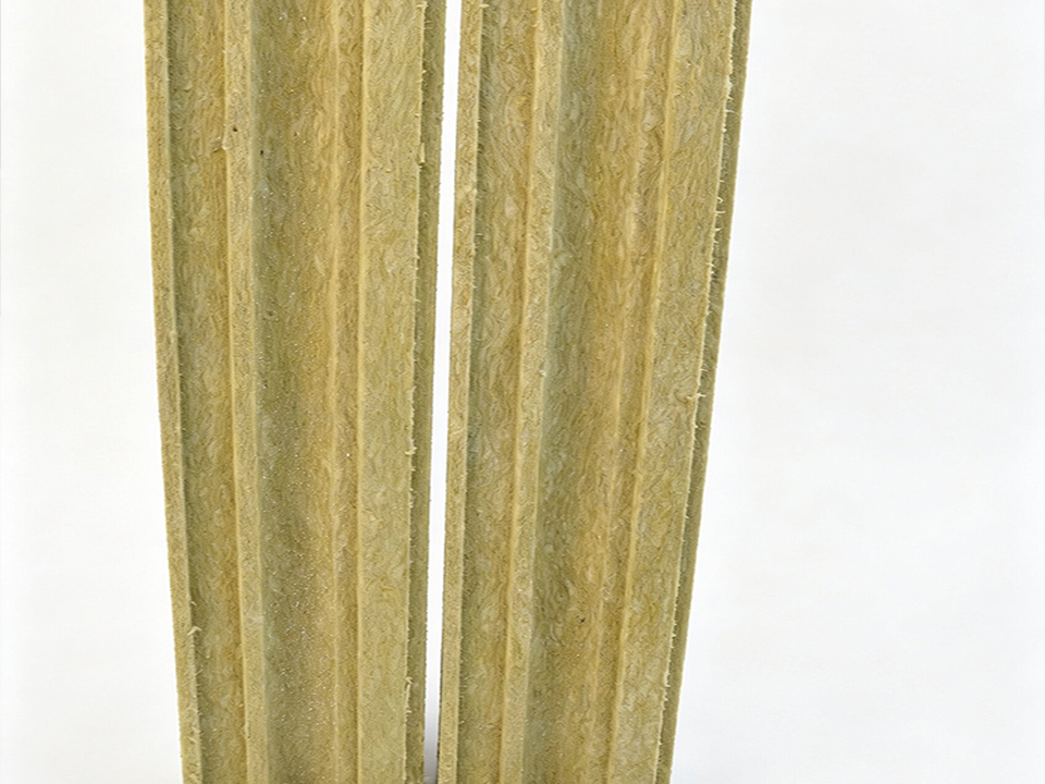 Detail of pre-cut slit at the end of stone wool pipe section